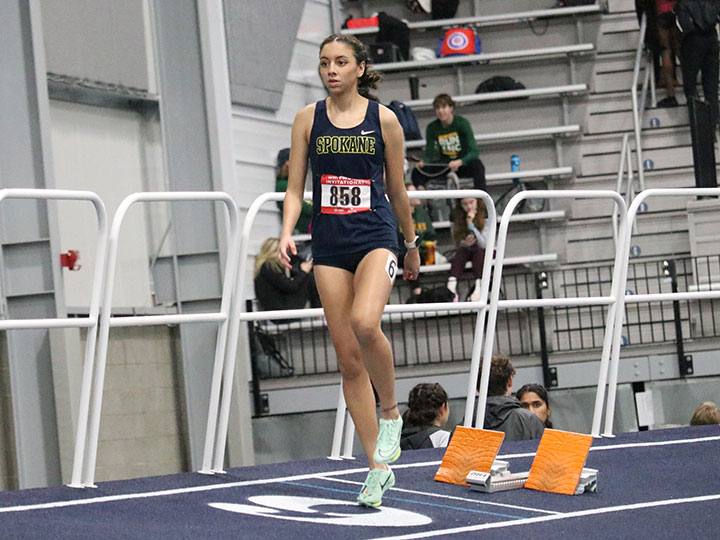 Women's track and field teammate starting to race.
