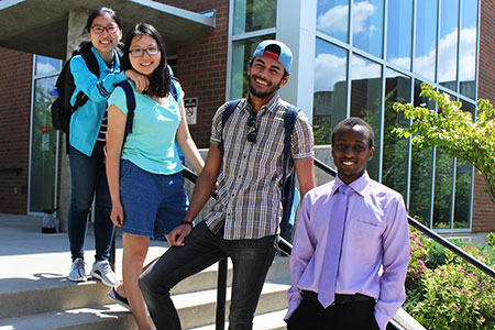 Group of International Students standing outside of SFCC’s library.